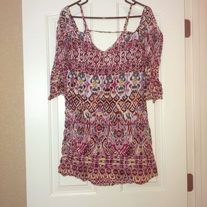 Off the shoulders dress.